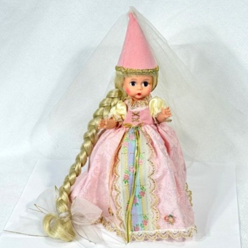Madame Alexander restrung 8" Rapunzel doll with stand.